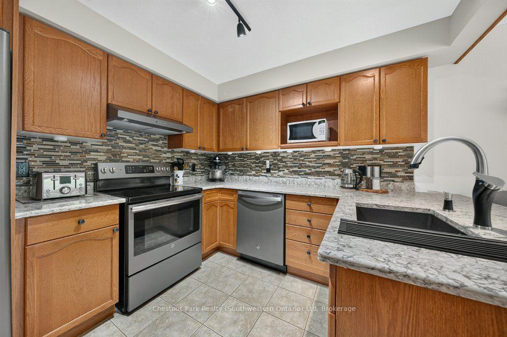 Photo 18 of Unit 48, 31 Schroder Crescent, Guelph, Grange Road — HOMEH