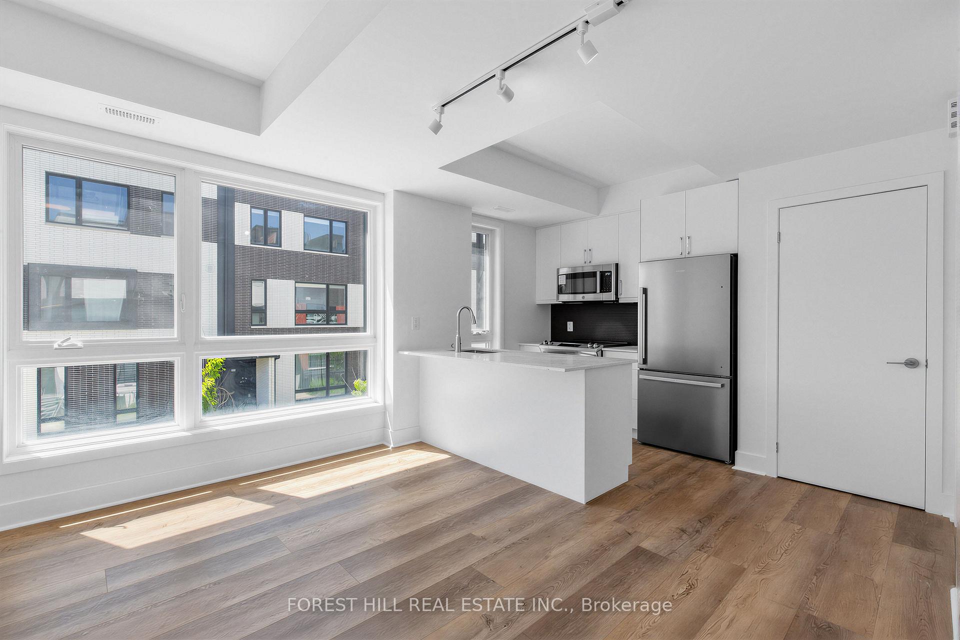 Photo 4 of Unit 2, 40 Ed Clark Gardens, Toronto, Weston-Pellam Park — HOMEH