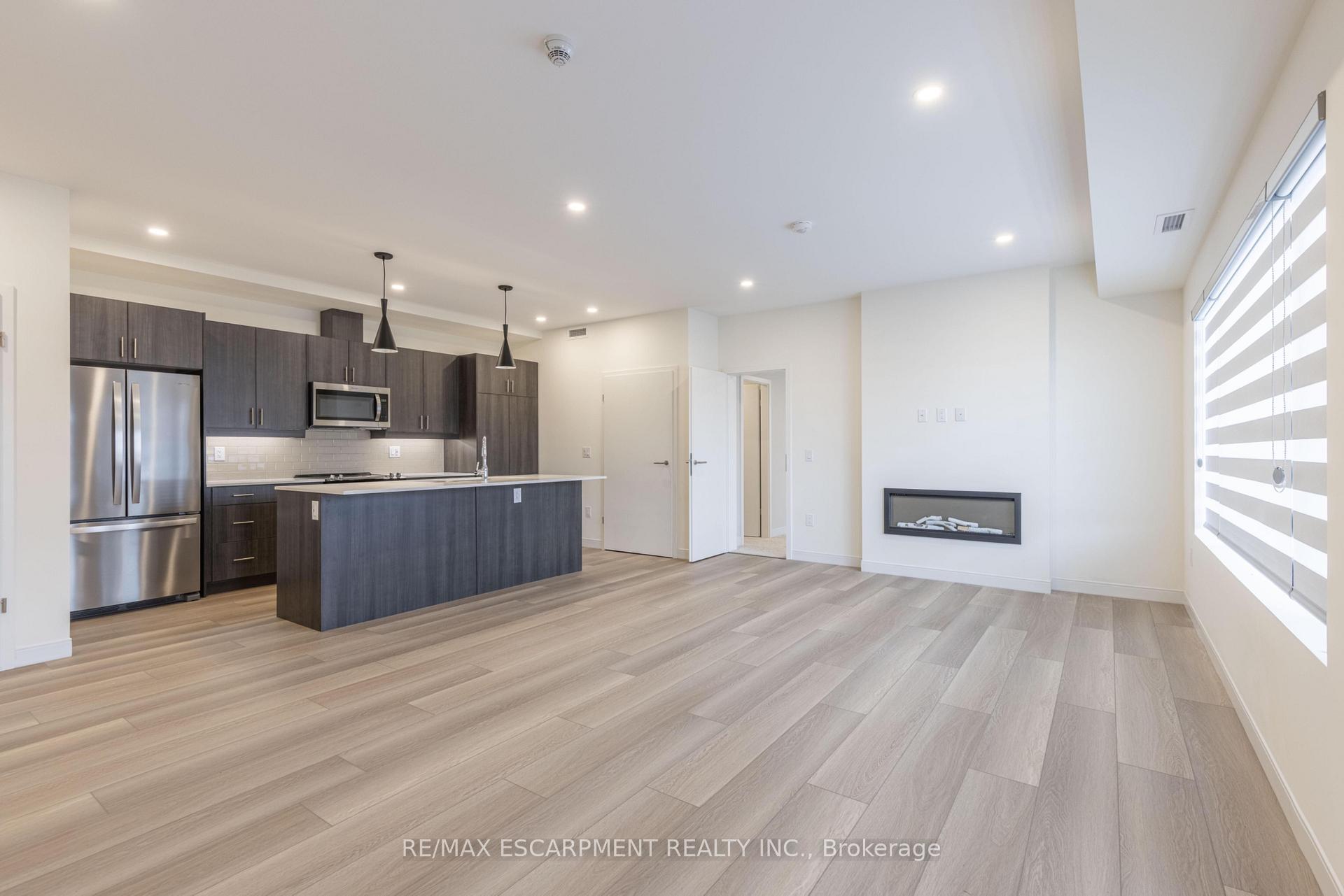 Photo 6 of Unit 107, 123 Lincoln Street, Welland, Broadway — HOMEH