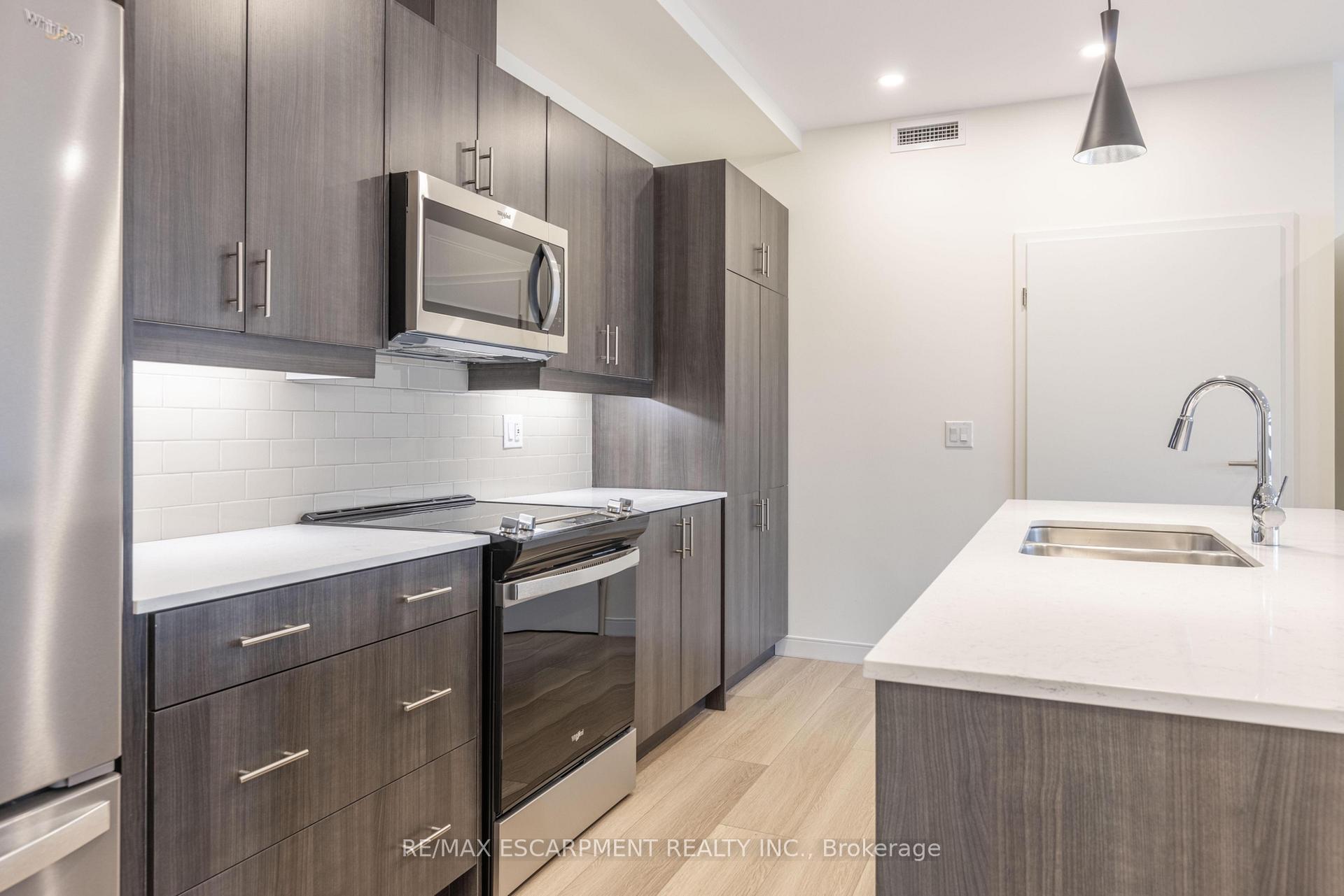 Photo 9 of Unit 107, 123 Lincoln Street, Welland, Broadway — HOMEH