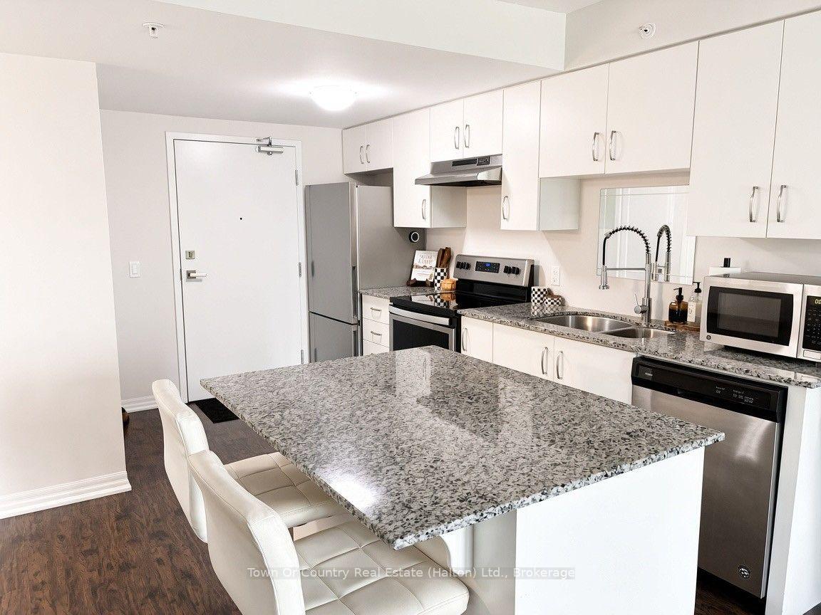 Photo 3 of Unit 104, 104 Summit Ridge Drive, Guelph, Grange Road — HOMEH