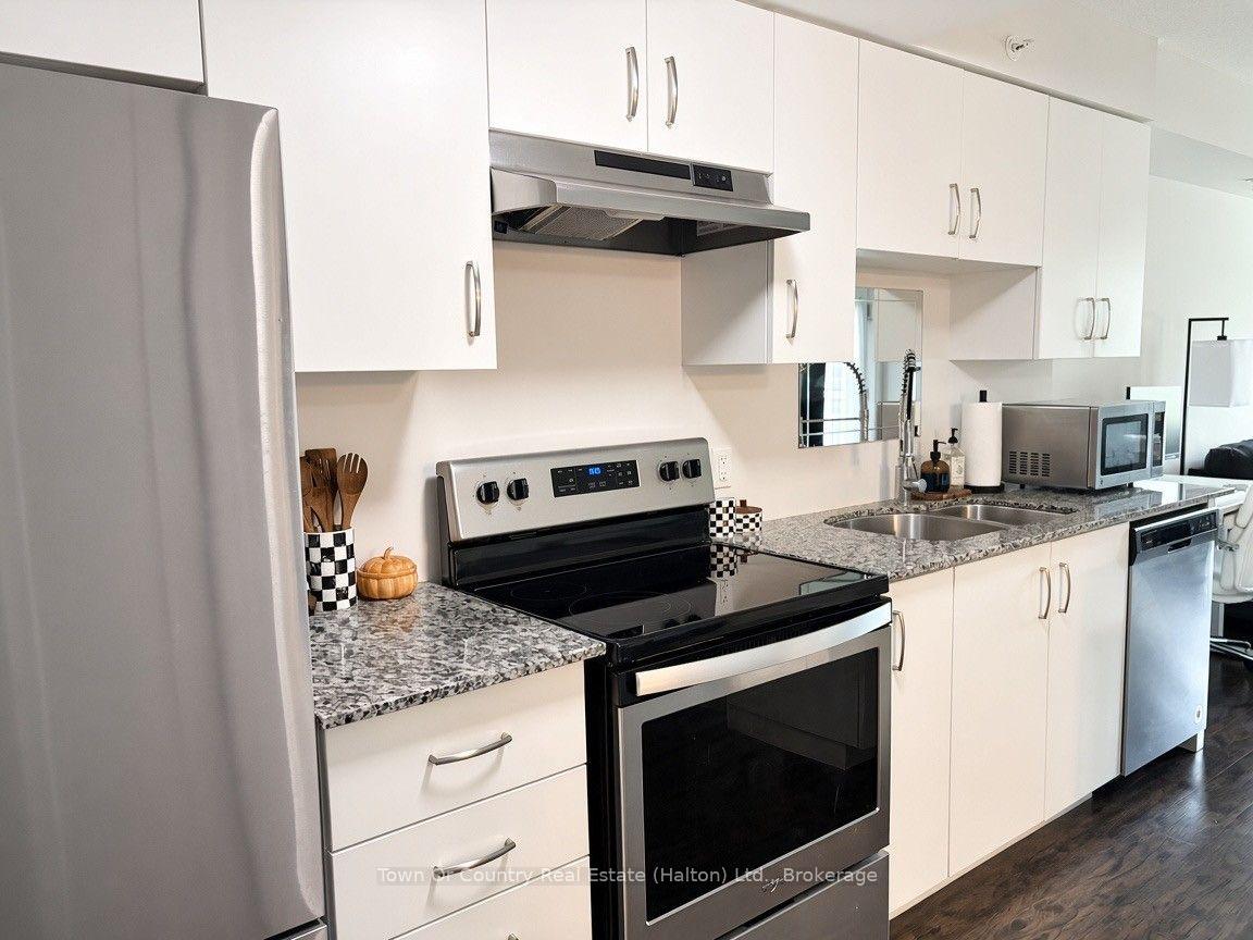 Photo 4 of Unit 104, 104 Summit Ridge Drive, Guelph, Grange Road — HOMEH