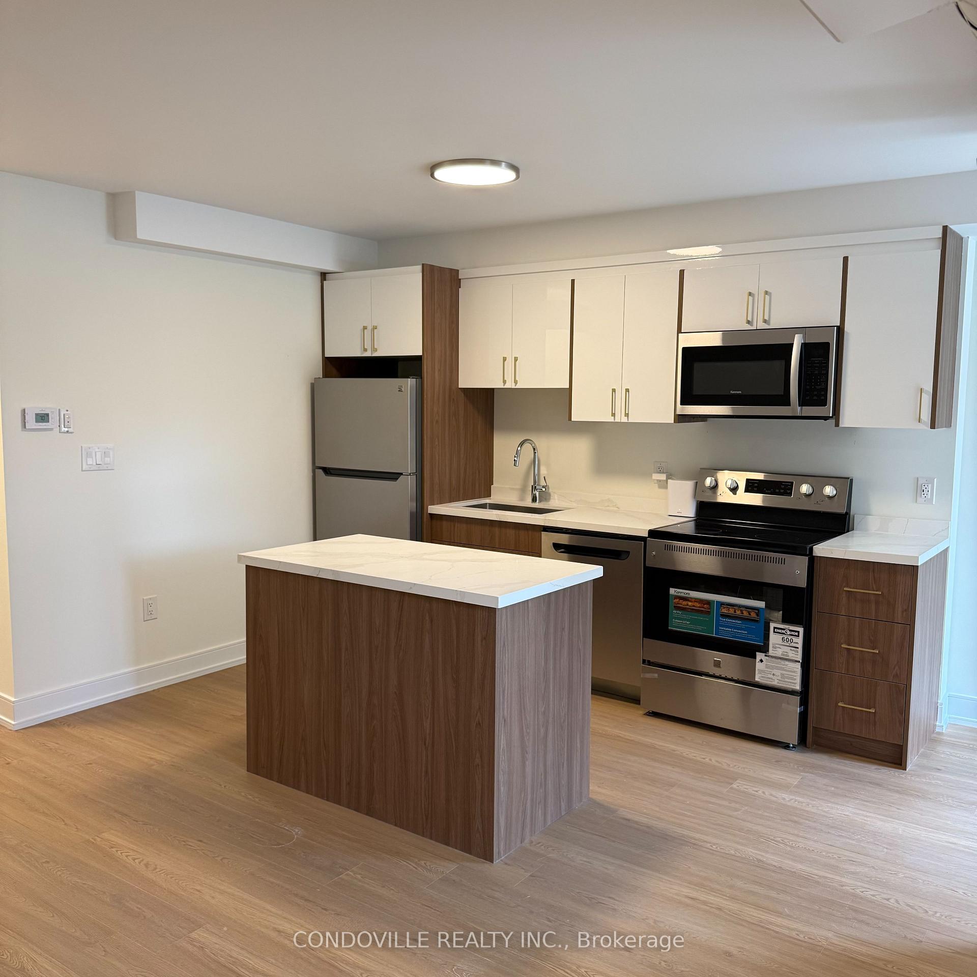 Photo 9 of Unit 3, 854 Doon Village Road E, Kitchener, Pioneer Park — HOMEH
