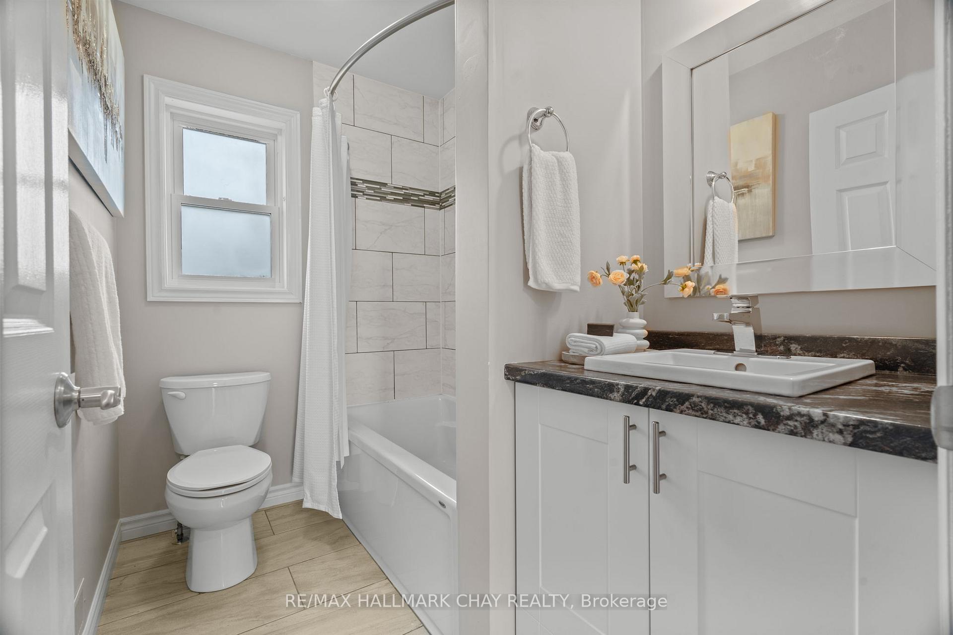 Photo 19 of Unit 4, 1 Olive Crescent, Orillia — HOMEH