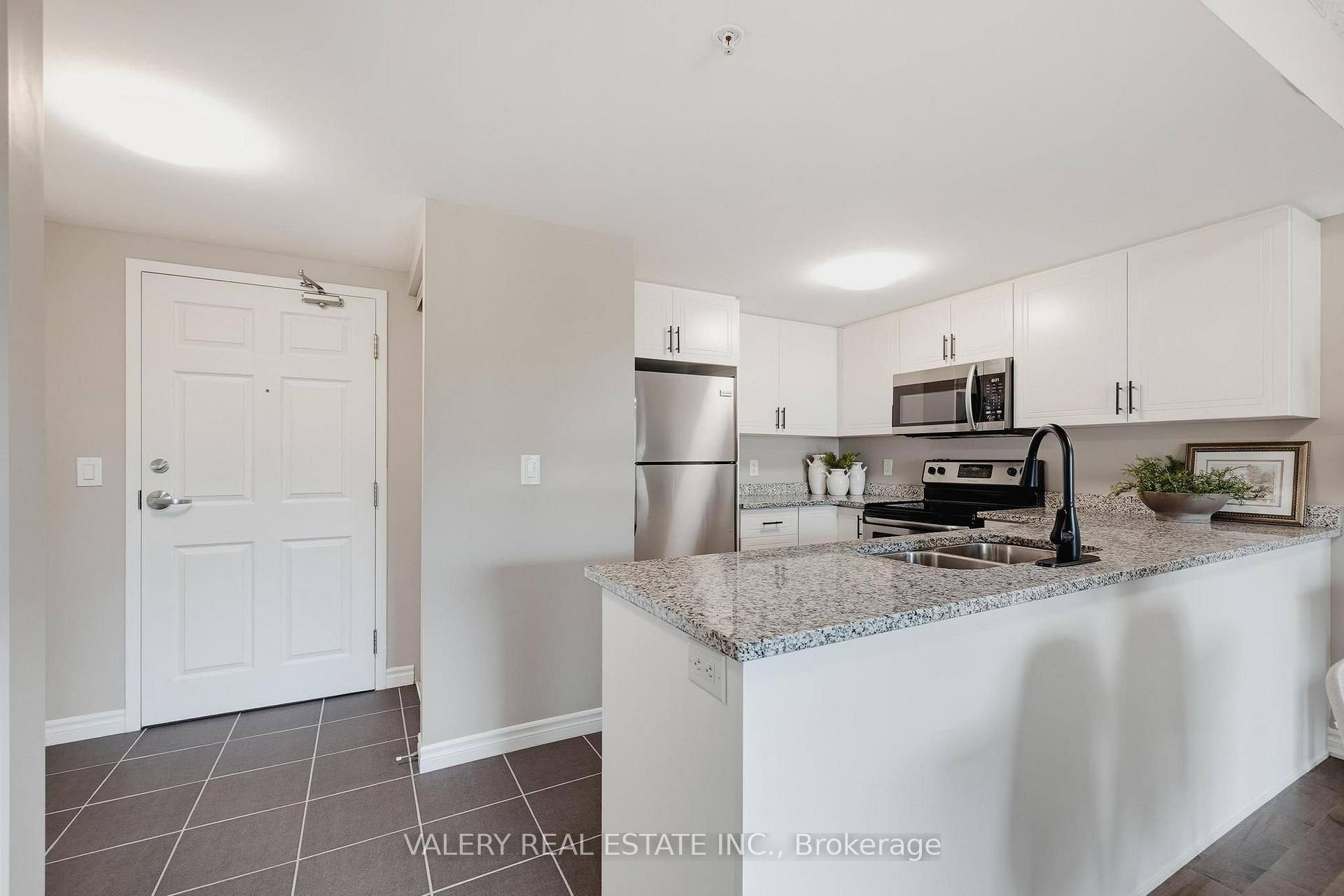 Photo 3 of Unit 207, 155 Commonwealth Street, Kitchener, Larentian West — HOMEH