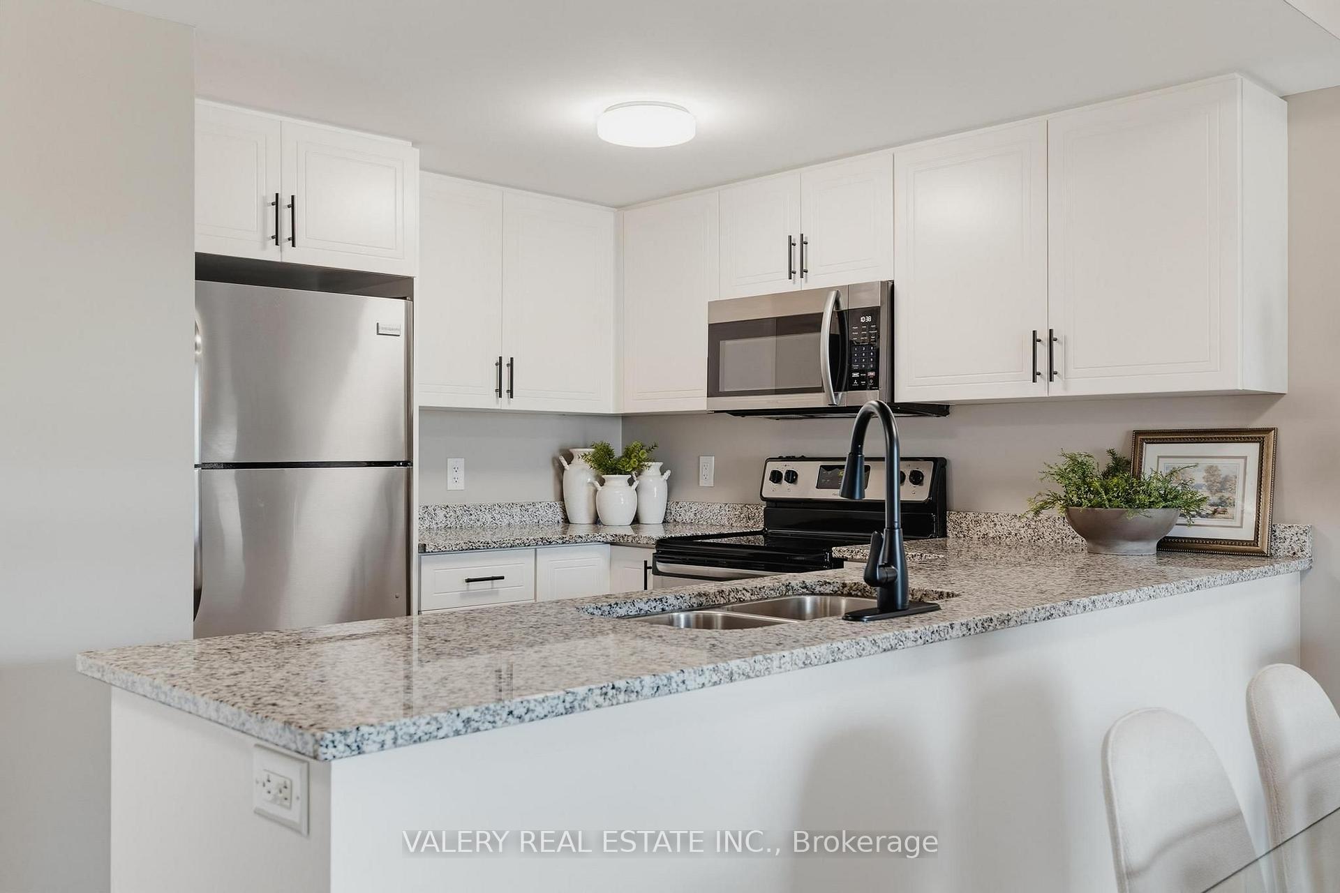 Photo 4 of Unit 207, 155 Commonwealth Street, Kitchener, Larentian West — HOMEH