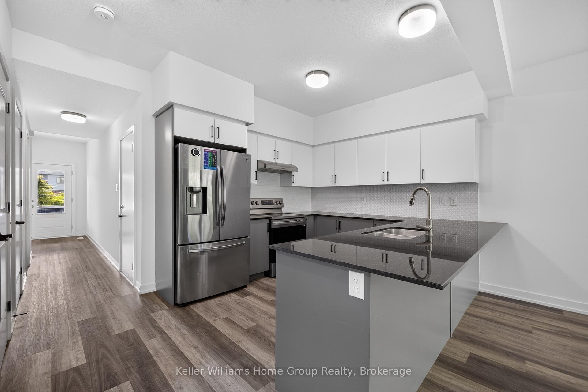 Photo 9 of 23 Ferris Circle, Guelph, Clairfields/Hanlon Business Park — HOMEH