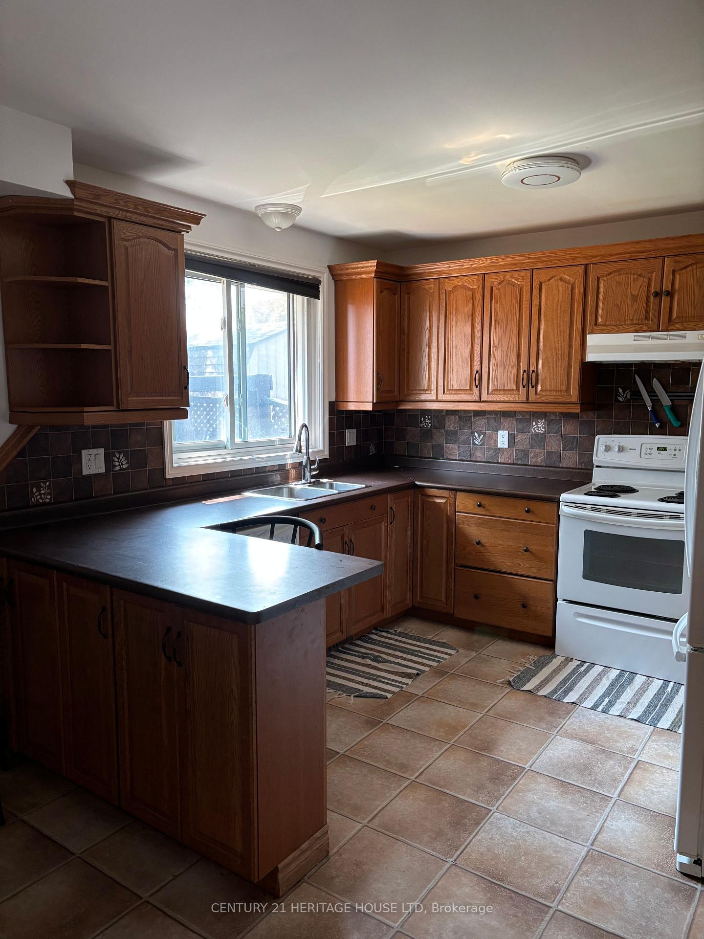 Photo 4 of Unit Main and Upper Floor, 29 Mccully Drive, St. Thomas — HOMEH
