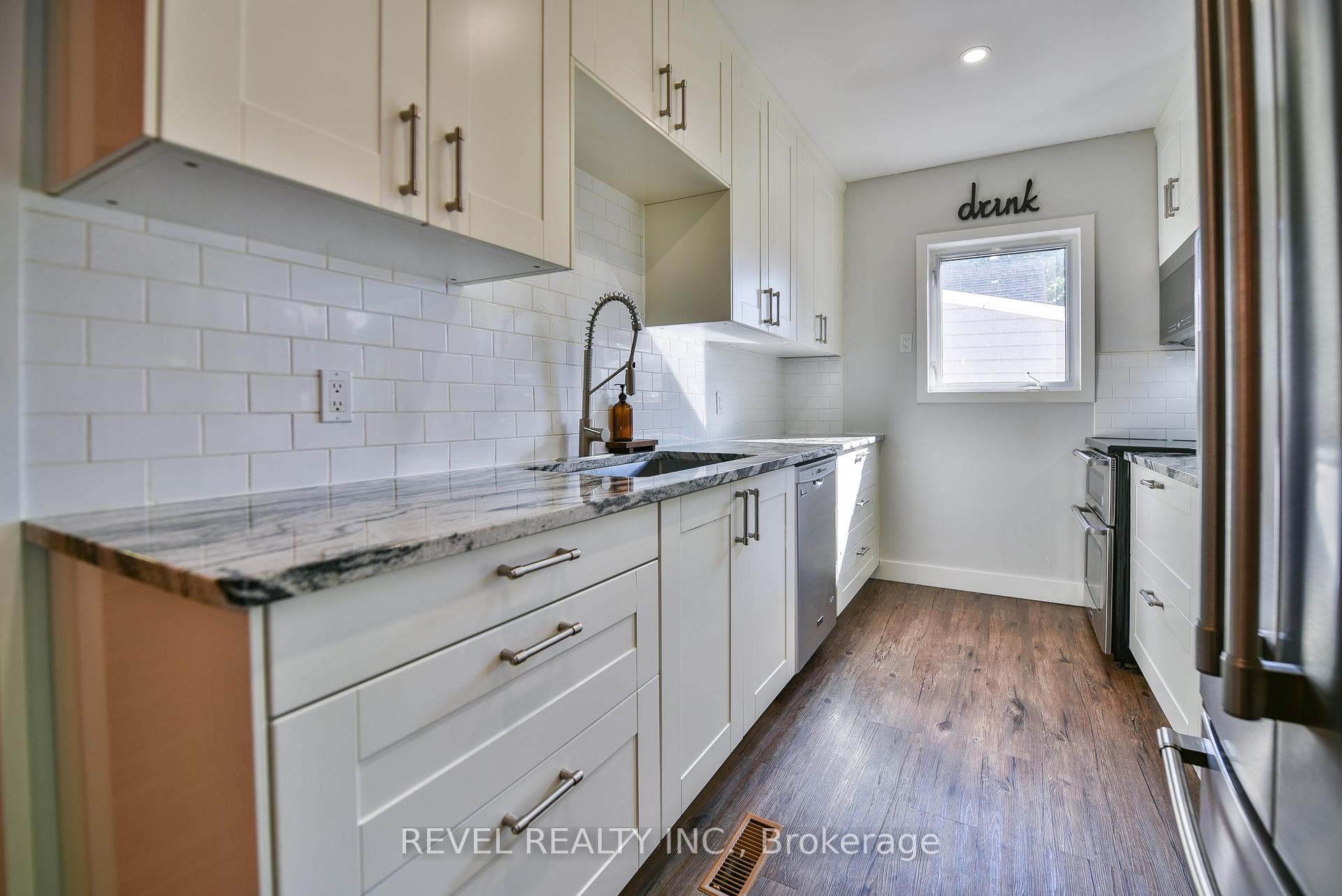 Photo 6 of 25 Shamrock Avenue, Timmins, TM - Outside East — HOMEH
