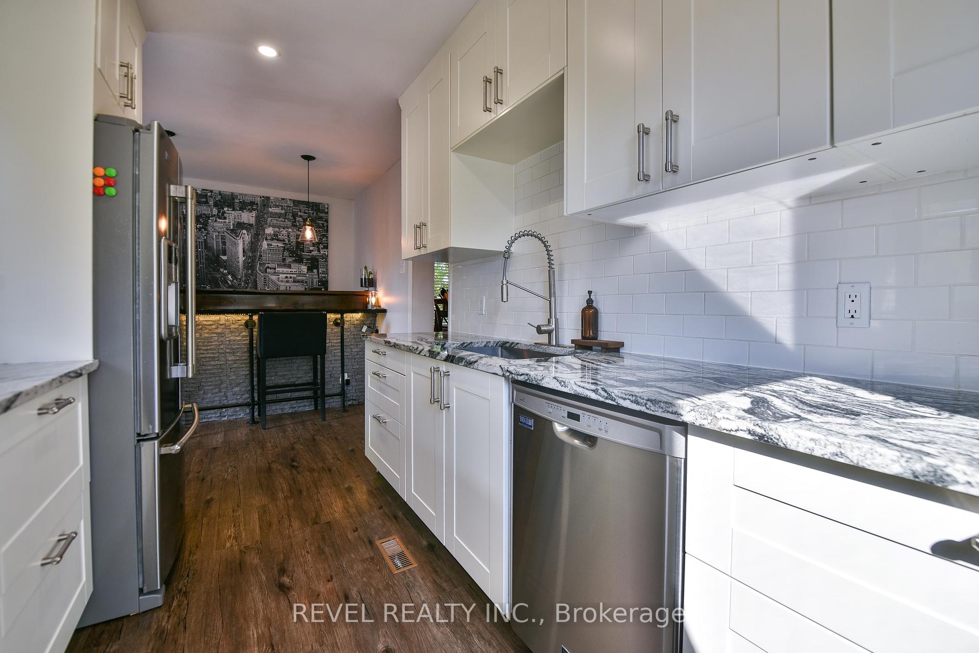 Photo 7 of 25 Shamrock Avenue, Timmins, TM - Outside East — HOMEH