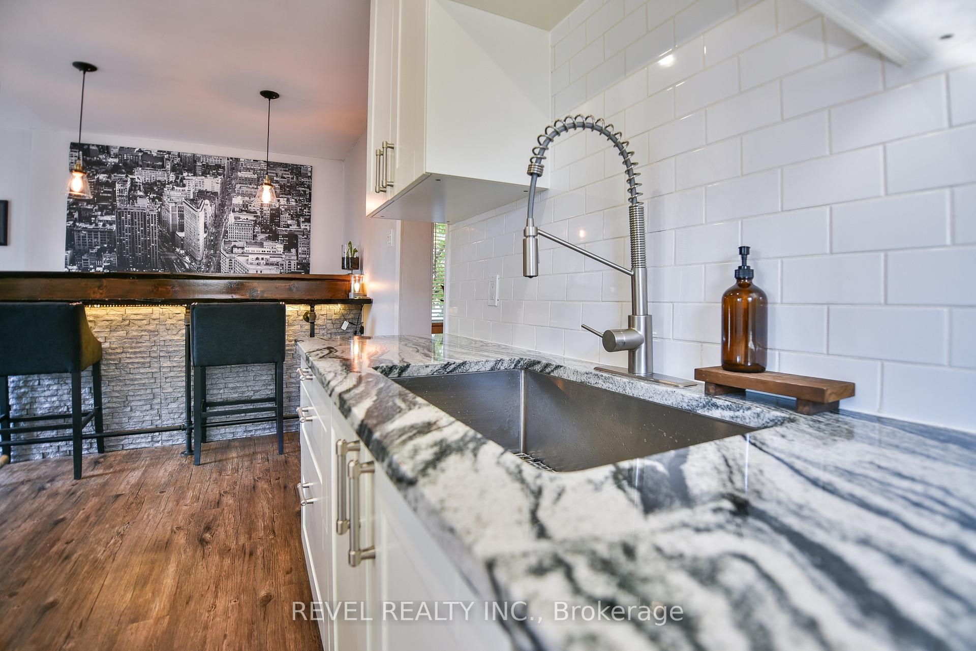 Photo 9 of 25 Shamrock Avenue, Timmins, TM - Outside East — HOMEH