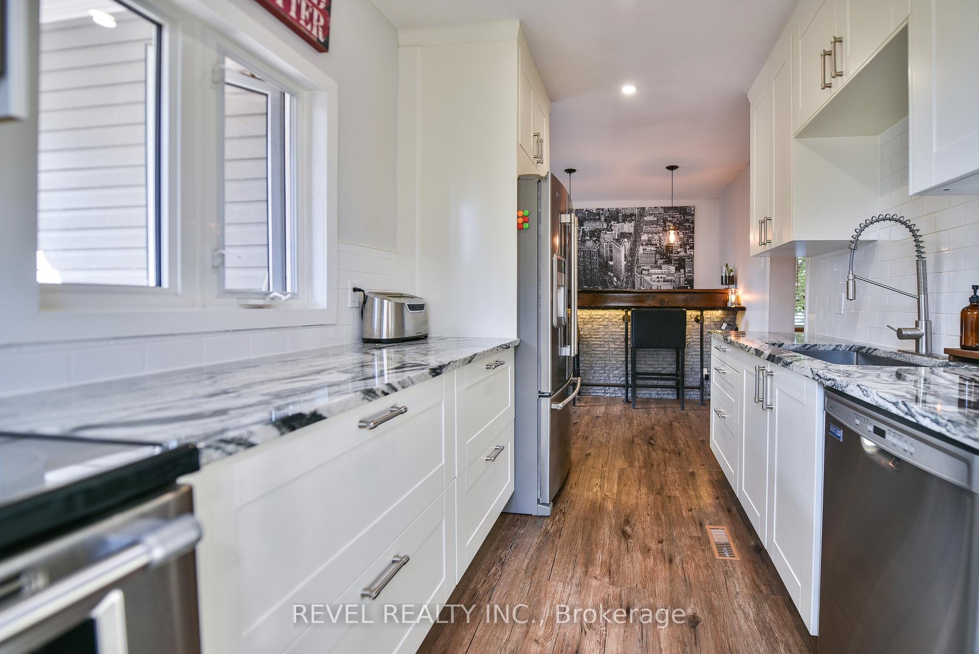 Photo 10 of 25 Shamrock Avenue, Timmins, TM - Outside East — HOMEH