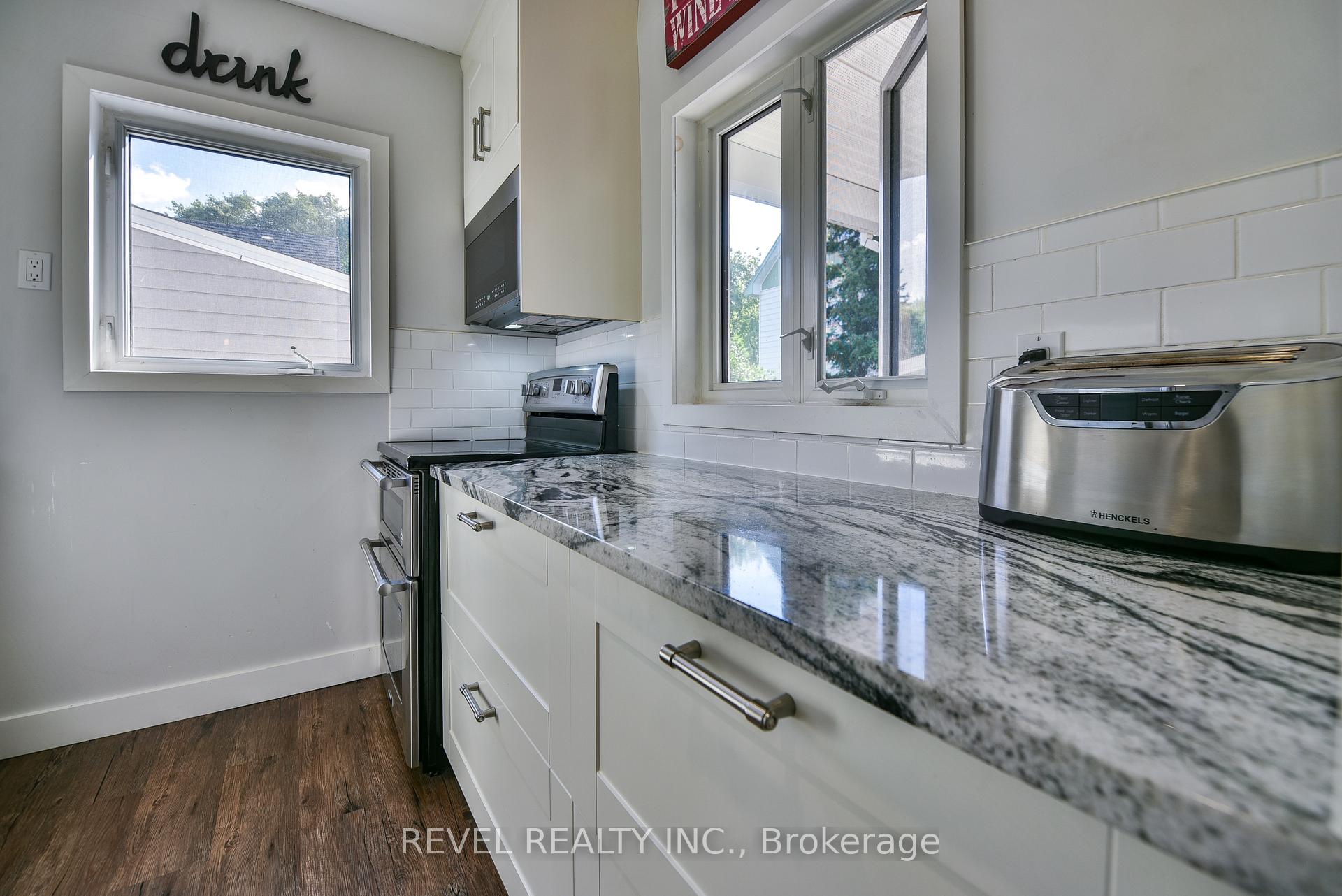 Photo 11 of 25 Shamrock Avenue, Timmins, TM - Outside East — HOMEH