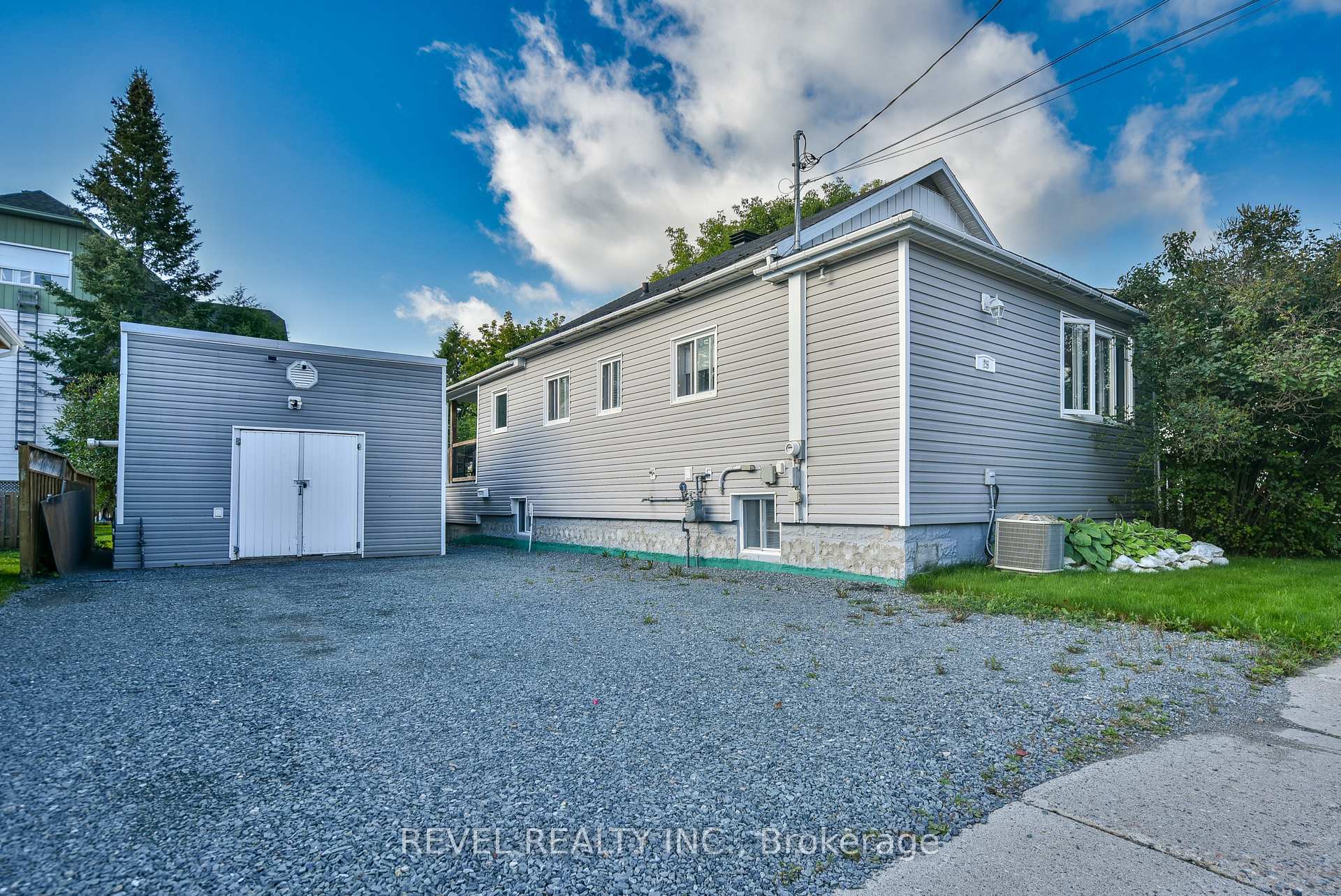 Photo 49 of 25 Shamrock Avenue, Timmins, TM - Outside East — HOMEH