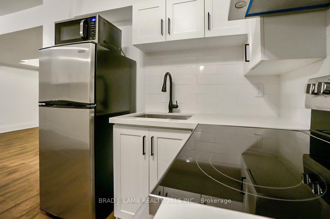 Photo 4 of Unit 3, 731 Indian Road, Toronto, High Park North — HOMEH