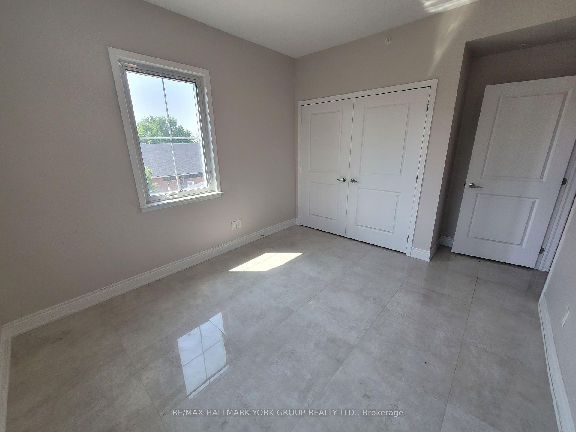 Photo 7 of Unit 308, 32 Wellington Street E, Aurora, Aurora Village — HOMEH