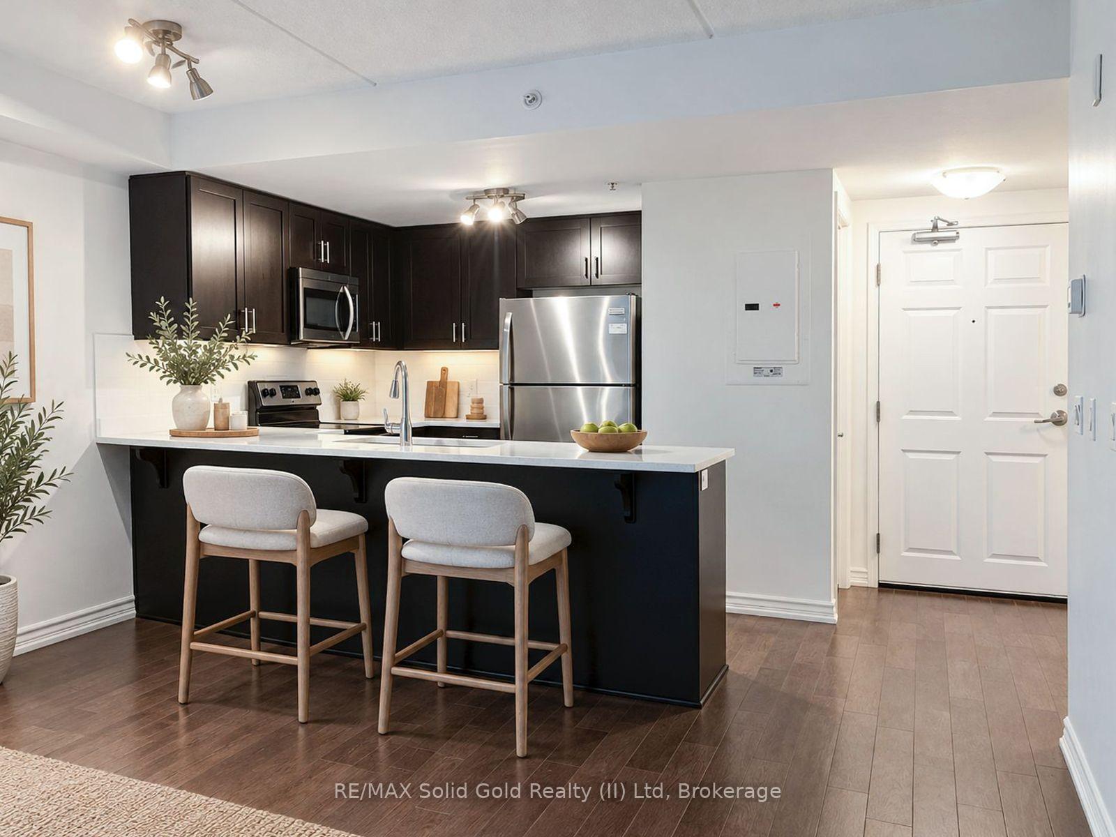 Photo 3 of Unit LL05, 50 Bryan Court, Kitchener, Grand River South — HOMEH