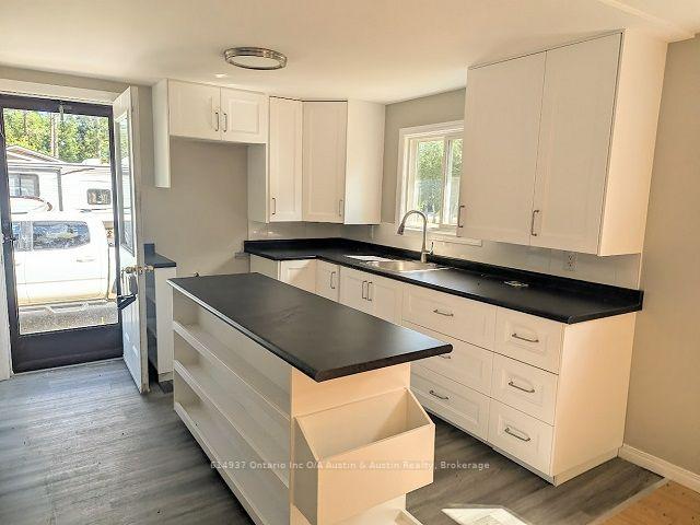 Photo 2 of 478 105 Highway, Kenora Remote Area, Vermilion Bay — HOMEH