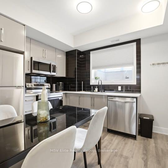 Photo 6 of Unit 111, 6065 McLeod Road, Niagara Falls, Arad/Fallsview — HOMEH
