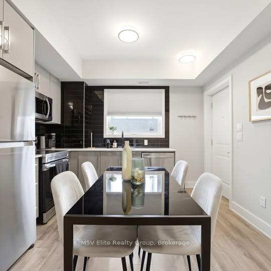 Photo 11 of Unit 111, 6065 McLeod Road, Niagara Falls, Arad/Fallsview — HOMEH