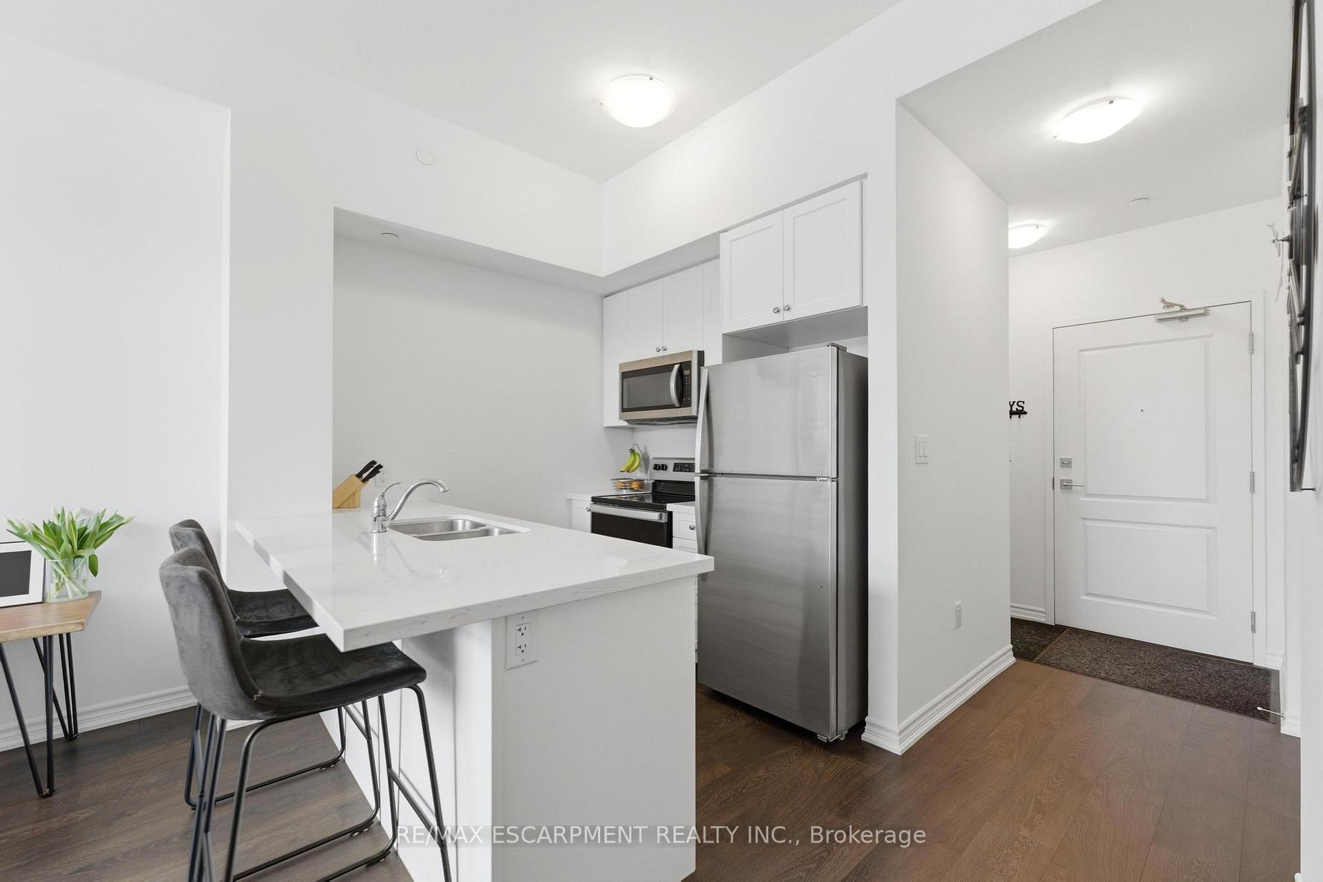 Photo 4 of Unit 112, 460 Dundas Street E, Hamilton, Waterdown — HOMEH