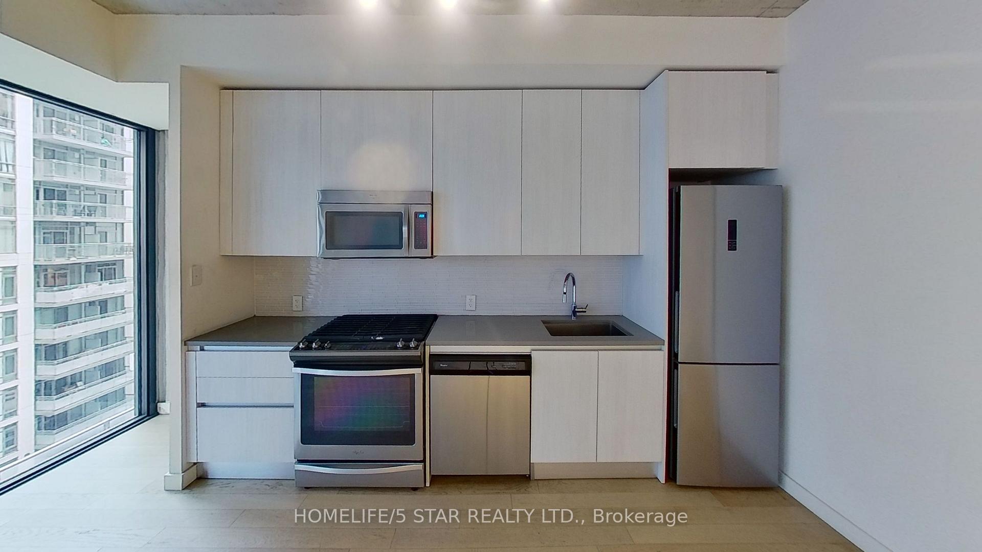 Photo 4 of Unit 714, 111 Bathurst Street, Toronto, Waterfront Communities — HOMEH