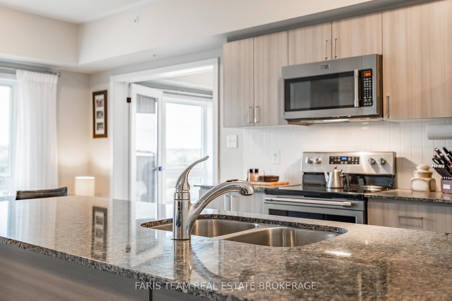 Photo 9 of Unit 402, 4 Spice Way, Barrie, Rural Barrie Southeast — HOMEH