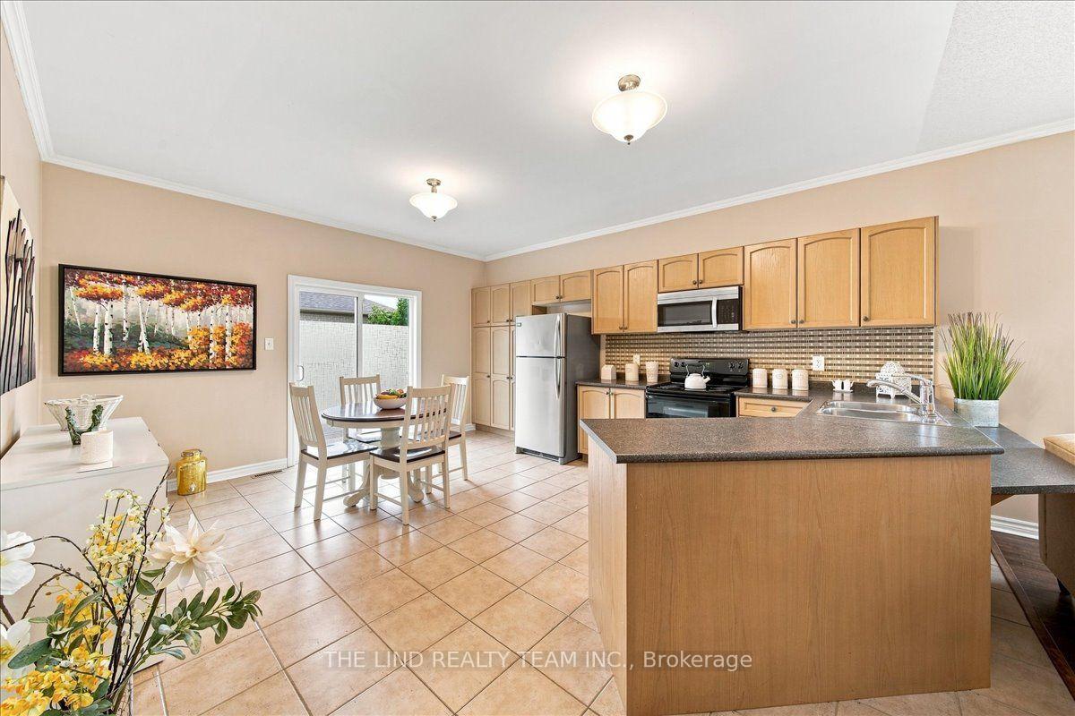 Photo 11 of 61 Mcintyre Drive, Barrie, Ardagh — HOMEH