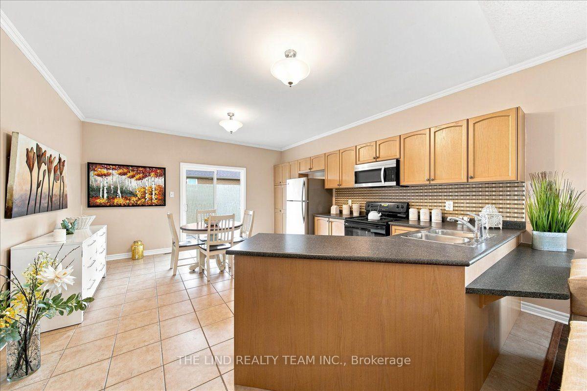 Photo 12 of 61 Mcintyre Drive, Barrie, Ardagh — HOMEH