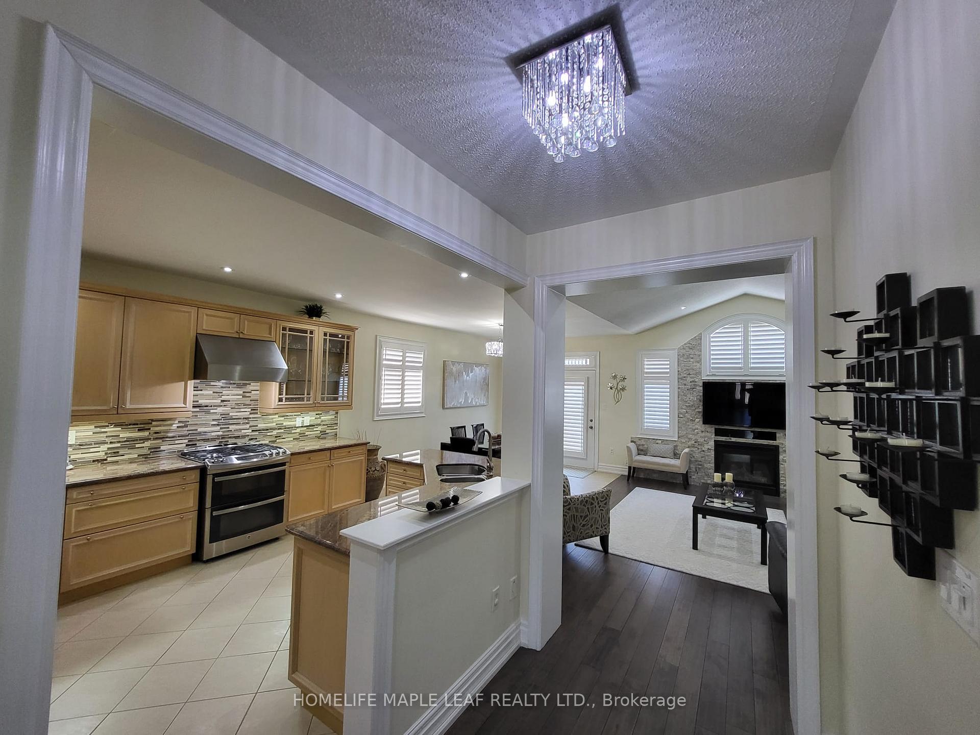 Photo 5 of 69 Huntspoint Drive, Brampton, Bram East — HOMEH