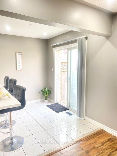 Photo 5 of 93 Tessler Crescent, Brampton, Brampton West — HOMEH