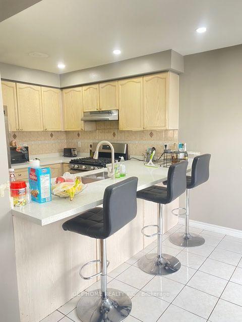 Photo 6 of 93 Tessler Crescent, Brampton, Brampton West — HOMEH