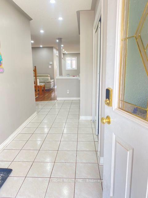 Photo 9 of 93 Tessler Crescent, Brampton, Brampton West — HOMEH