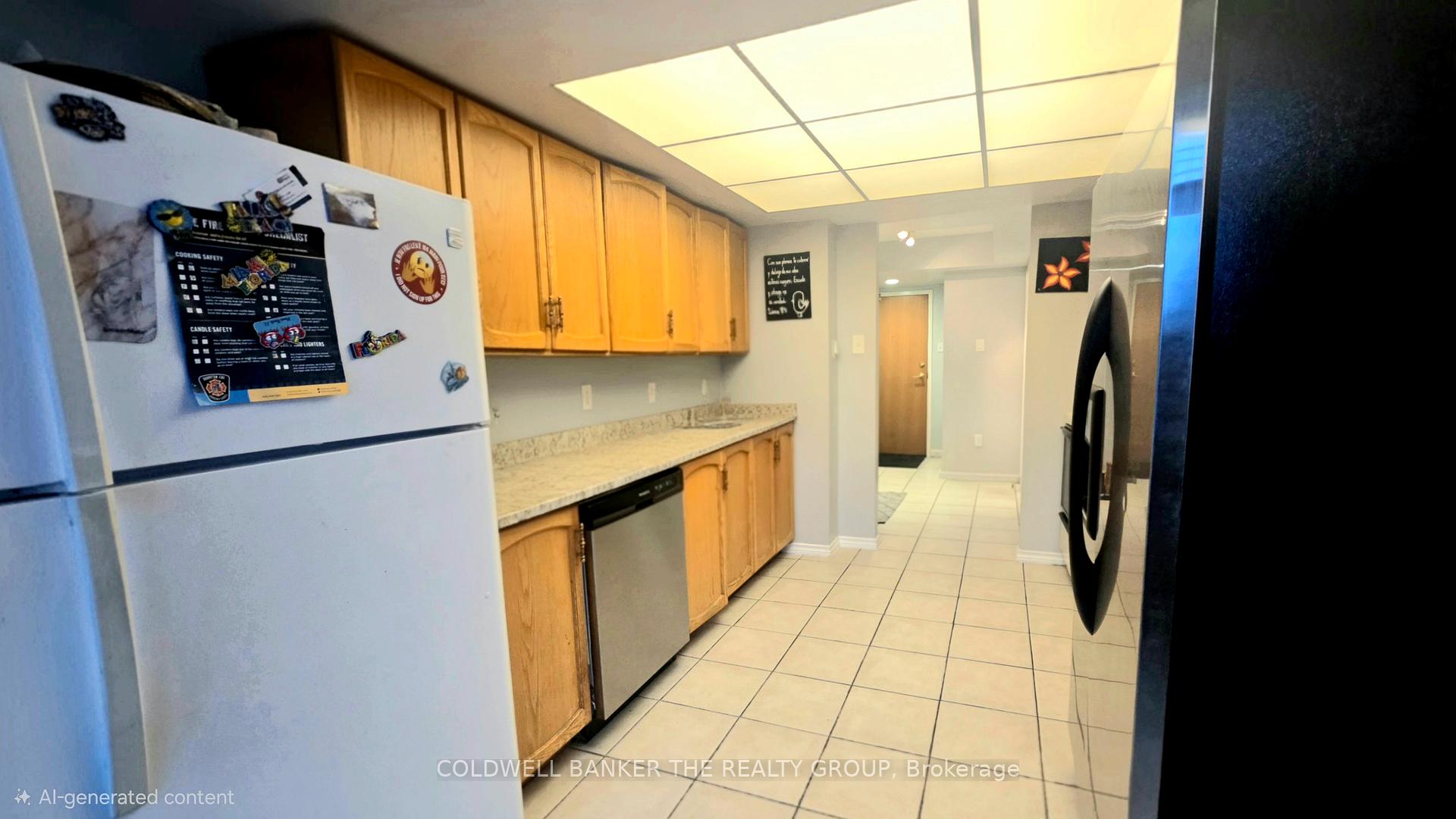 Photo 5 of Unit 410, 330 Mill Street S, Brampton, Brampton South — HOMEH
