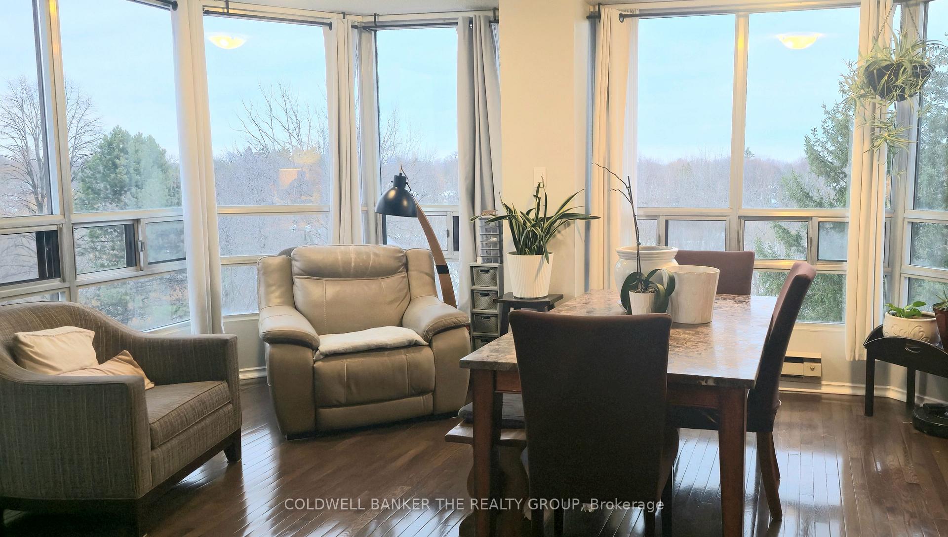 Photo 9 of Unit 410, 330 Mill Street S, Brampton, Brampton South — HOMEH