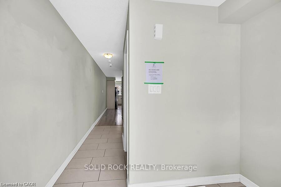 Photo 5 of 457 Queen Mary Drive, Brampton, Northwest Brampton — HOMEH