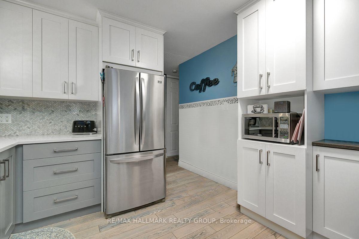Photo 19 of 295 Kennedy Lane E, Ottawa, Bilberry Creek/Queenswood Heights — HOMEH
