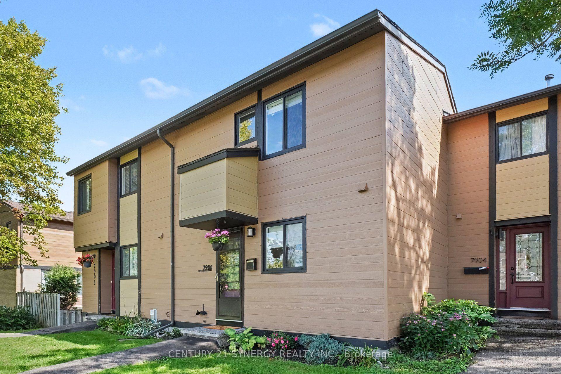 Front of Unit 53, 7906 Jeanne Darc Boulevard N