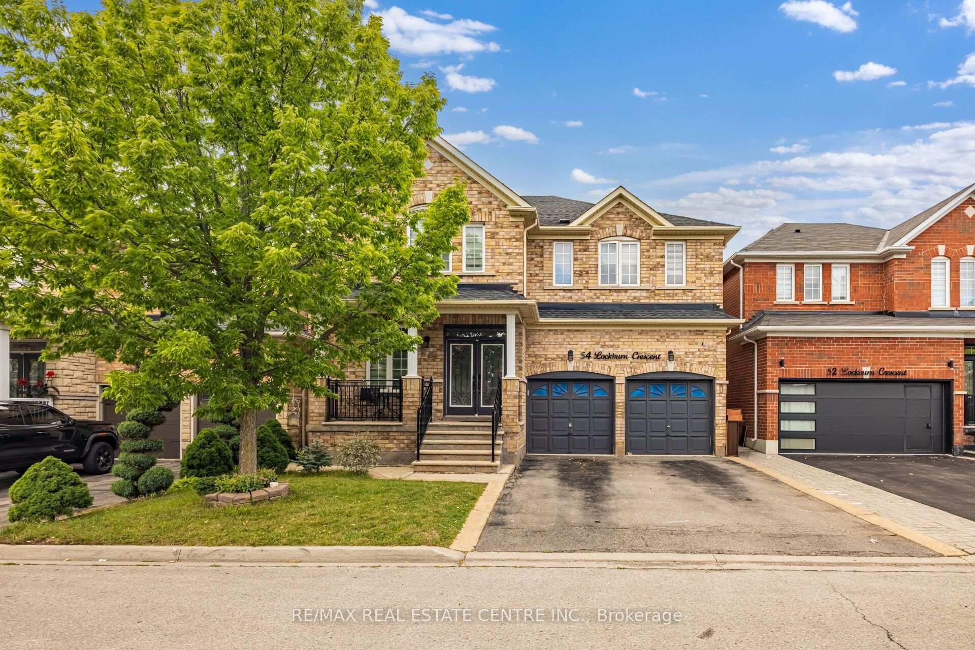 Photo 2 of 54 Lockburn Crescent, Brampton, Fletcher's Meadow — HOMEH