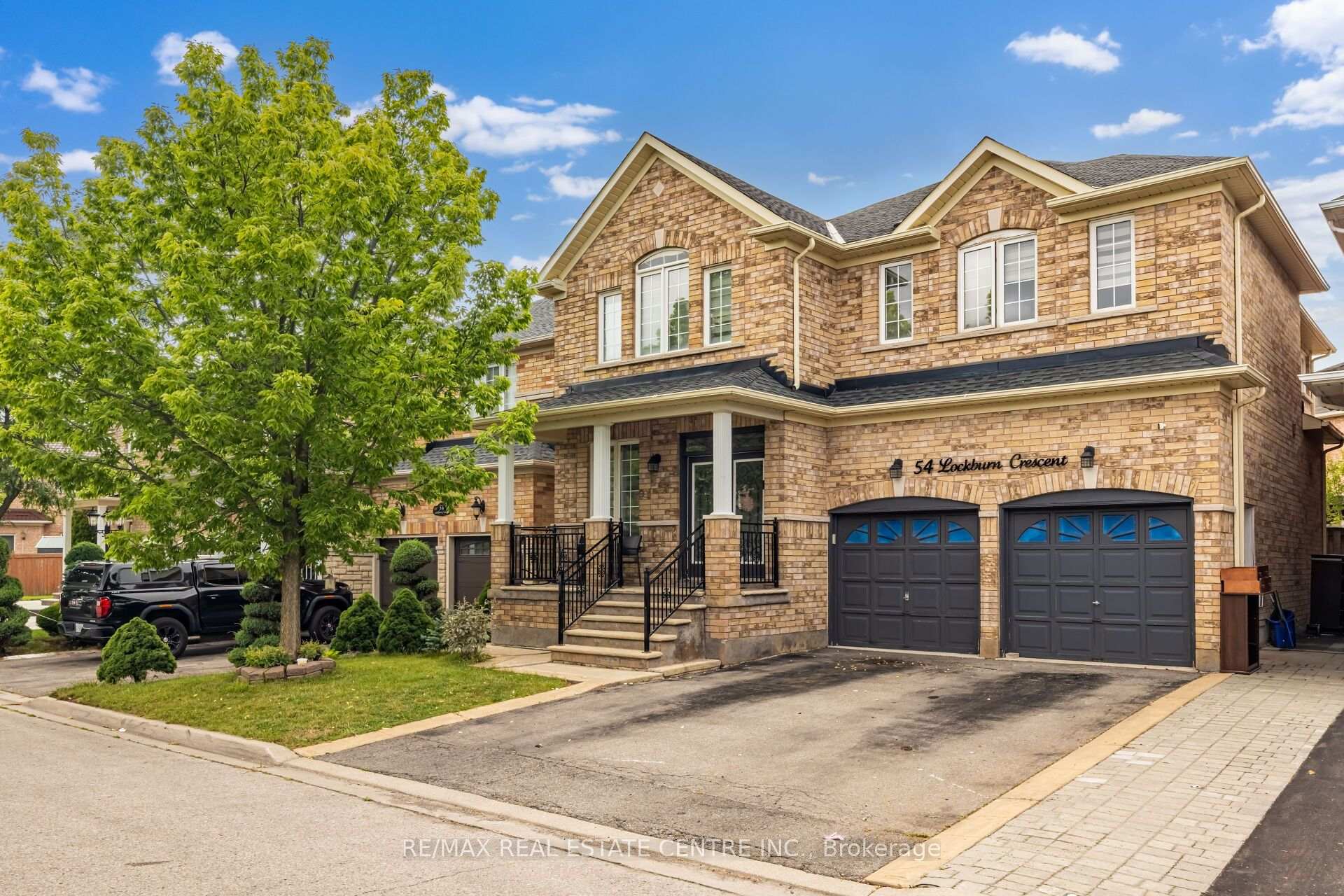 Photo 3 of 54 Lockburn Crescent, Brampton, Fletcher's Meadow — HOMEH