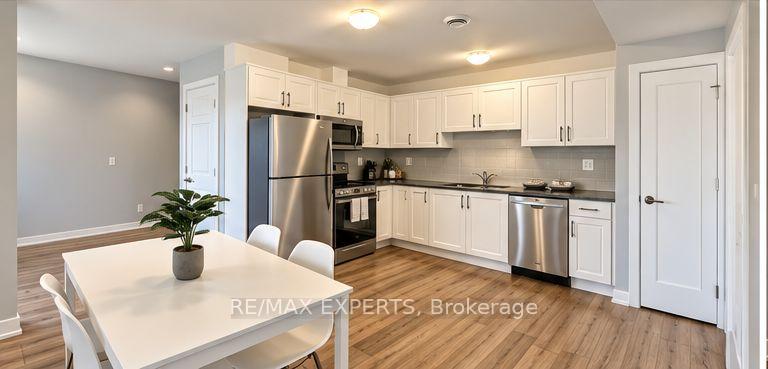 Photo 8 of Unit 435, 4263 Fourth Avenue, Niagara Falls, Downtown — HOMEH