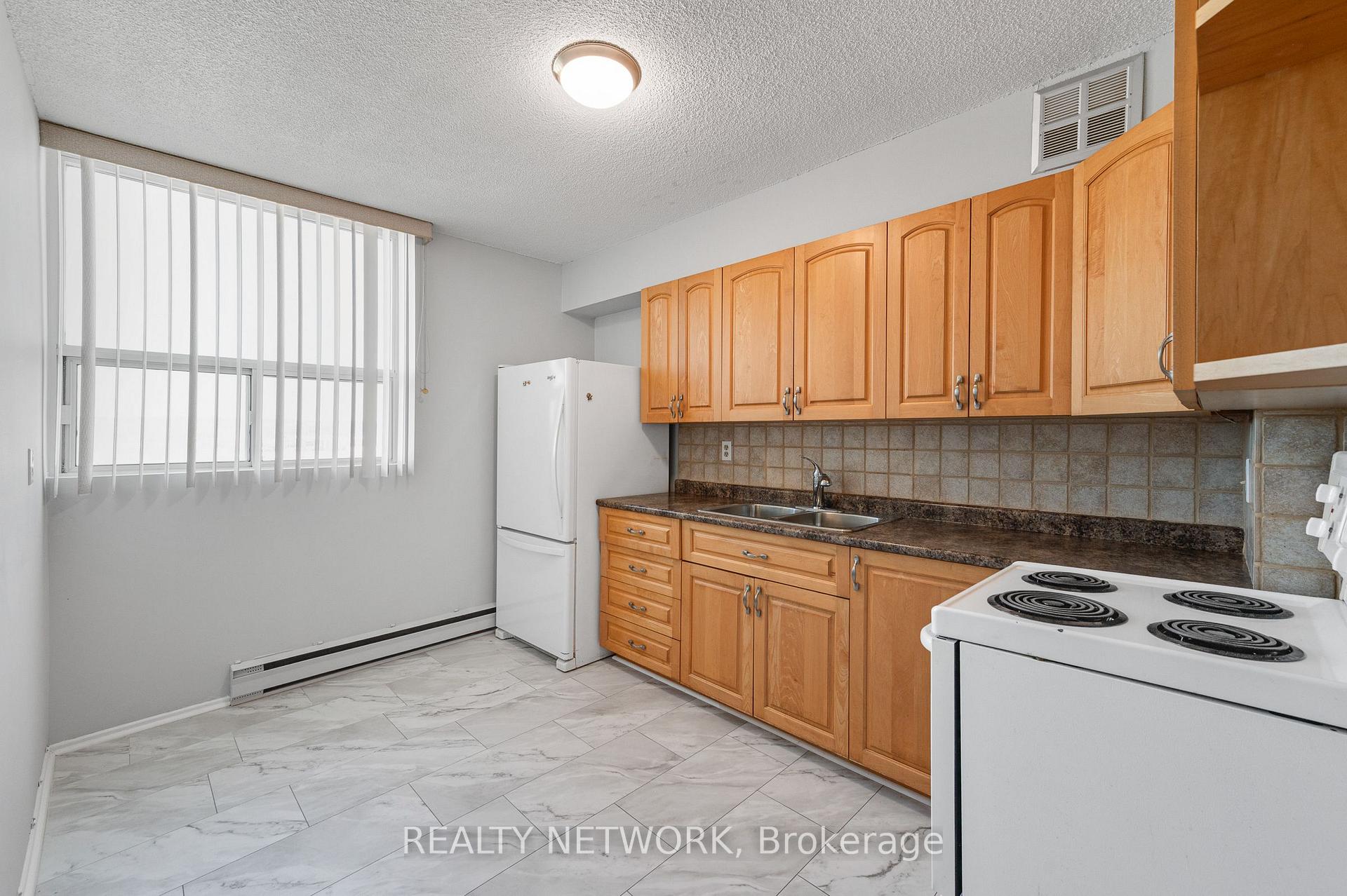 Photo 24 of Unit 1210, 700 Dynes Road, Burlington, Roseland — HOMEH