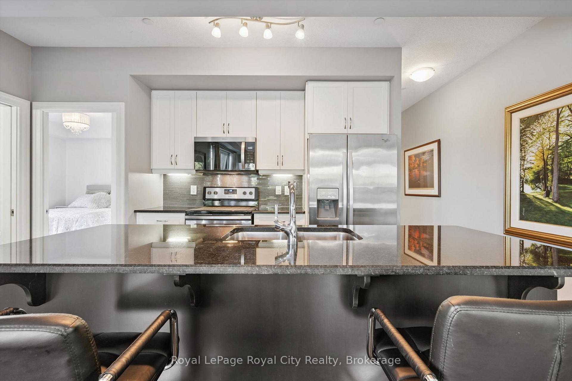 Photo 11 of Unit 306, 150 Wellington Street E, Guelph, Downtown — HOMEH