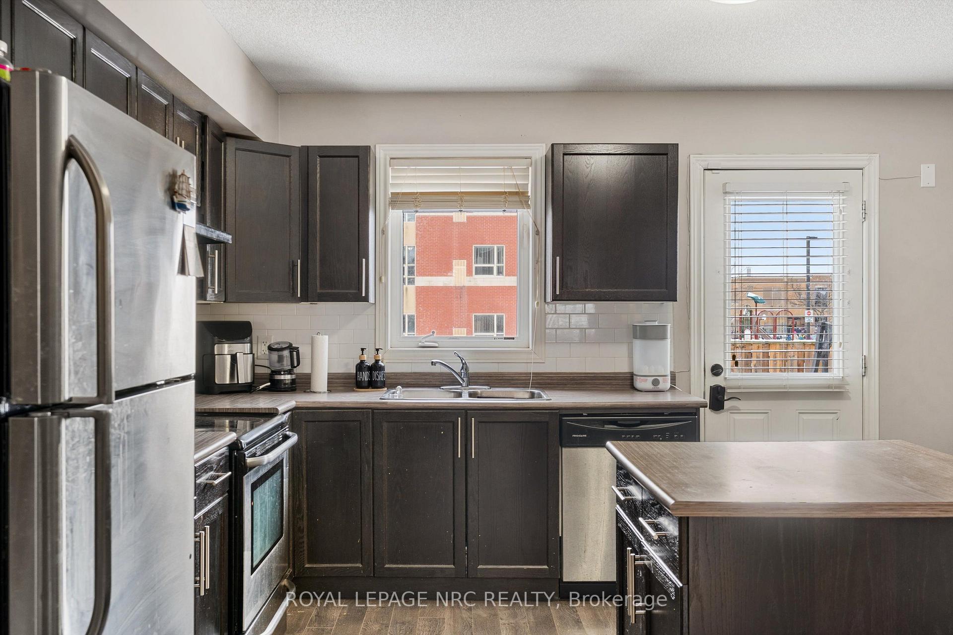 Photo 15 of Unit 6, 6118 Kelsey Crescent, Niagara Falls, Forestview — HOMEH