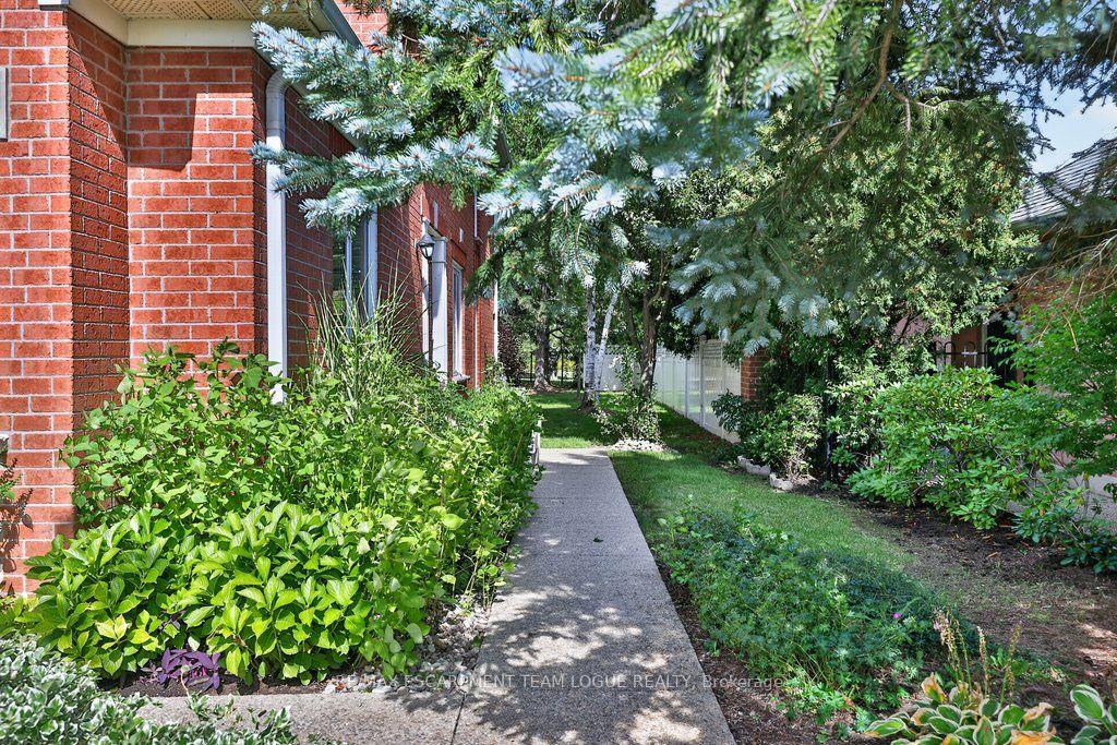 Photo 4 of Unit 9, 2103 Berwick Drive, Burlington, Rose — HOMEH