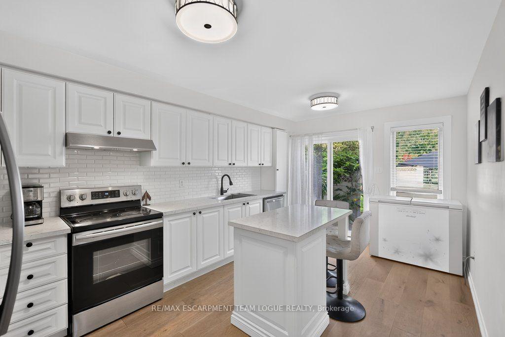 Photo 11 of Unit 9, 2103 Berwick Drive, Burlington, Rose — HOMEH