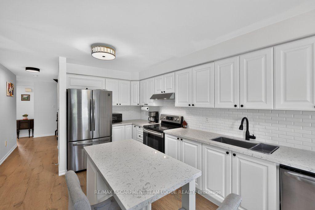 Photo 13 of Unit 9, 2103 Berwick Drive, Burlington, Rose — HOMEH
