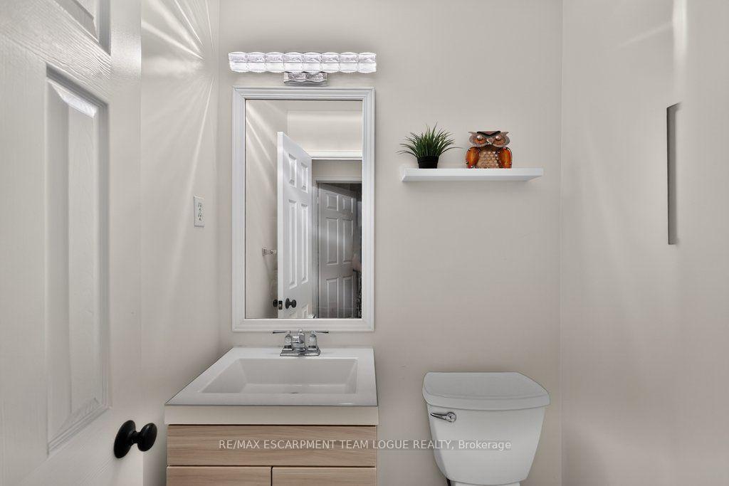 Photo 17 of Unit 9, 2103 Berwick Drive, Burlington, Rose — HOMEH