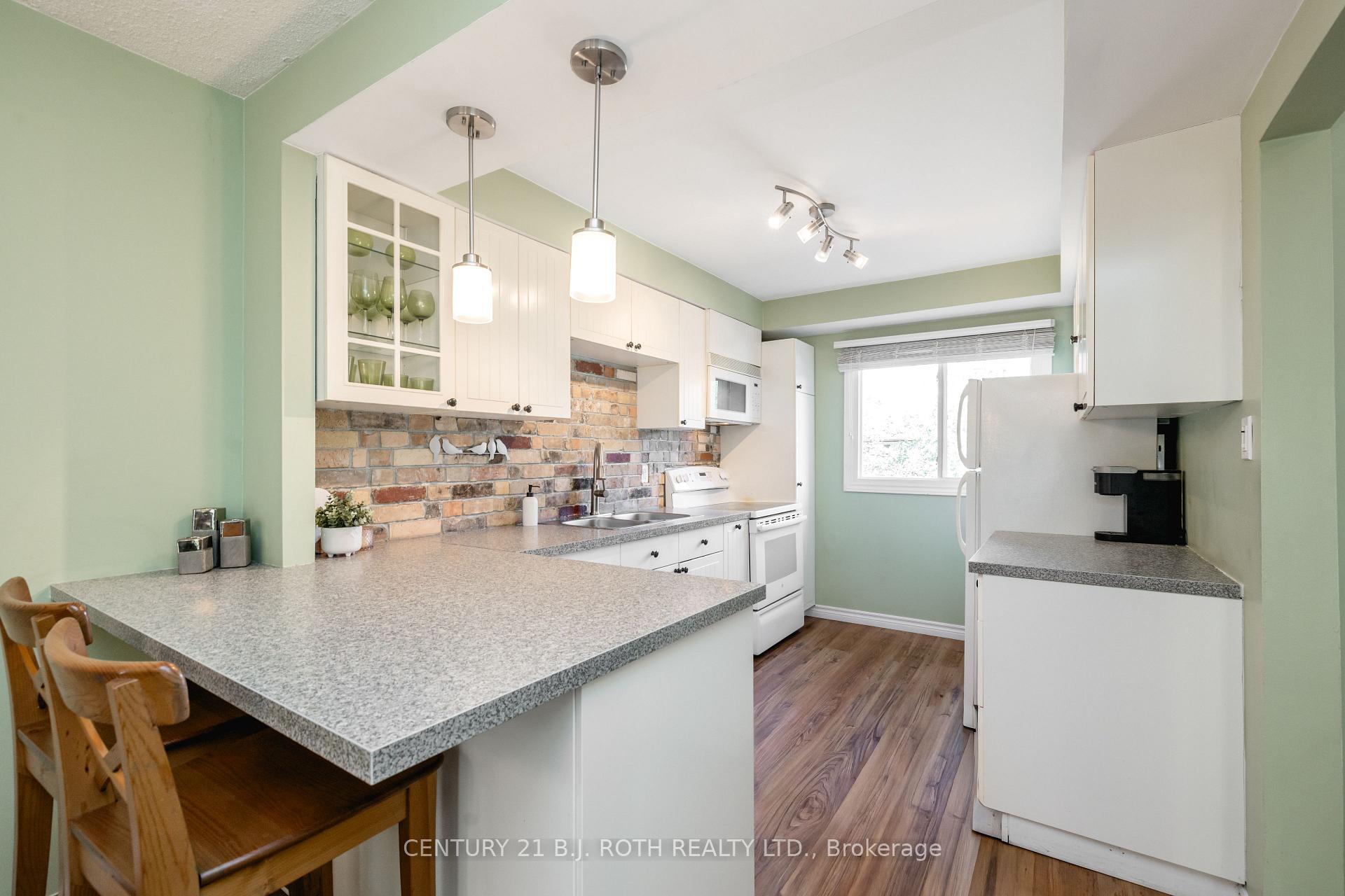 Photo 10 of Unit 31, 52 Adelaide Street, Barrie, Allandale — HOMEH