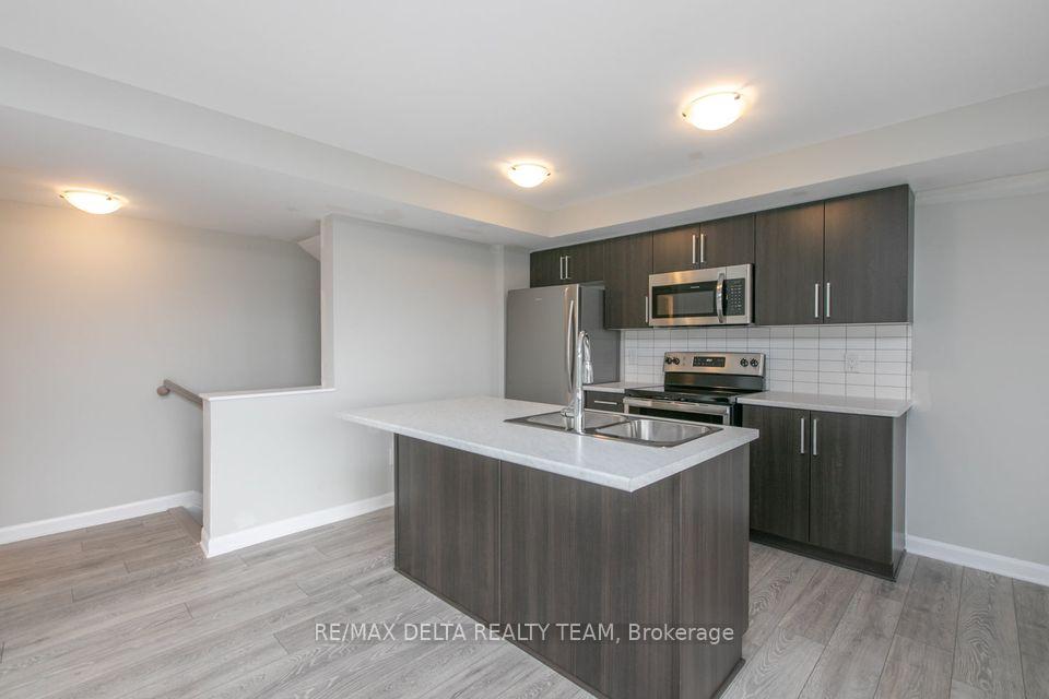Photo 2 of Unit Unit D, 701 Amberwing Private, Ottawa, Avalon West — HOMEH